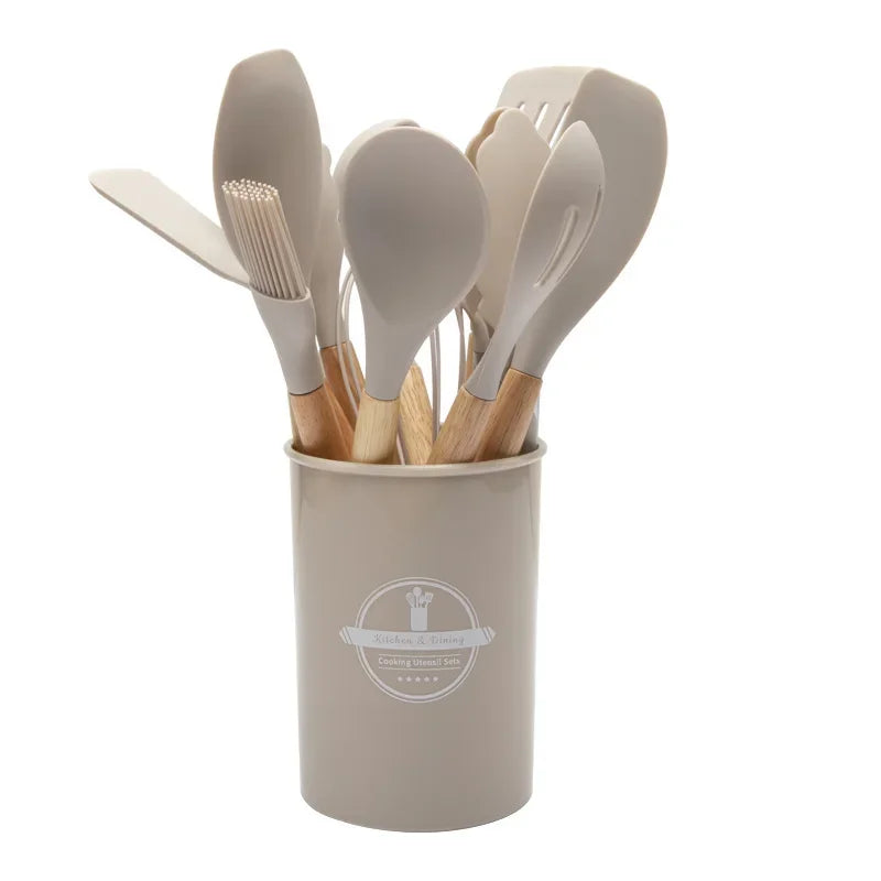 This 12-piece silicone kitchen utensil set combines high-quality, heat-resistant silicone with ergonomic wooden handles for superior comfort and grip. Designed for use with nonstick cookware, these tools prevent scratching while withstanding temperatures up to 446°F (230°C). The BPA-free, dishwasher-safe construction ensures safety and easy cleaning. Versatile and durable, this set is ideal for a wide range of cooking tasks, offering both functionality and longevity in your kitchen.