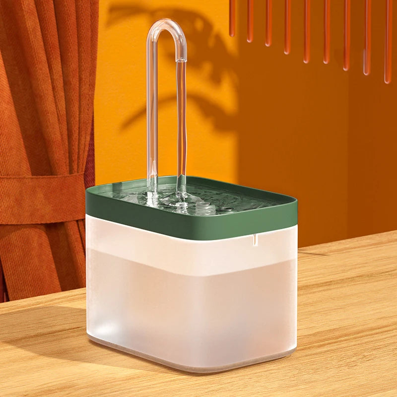 A modern water fountain with a sleek square design, dimensions labelled, showcasing a clear water stream and minimalistic style.