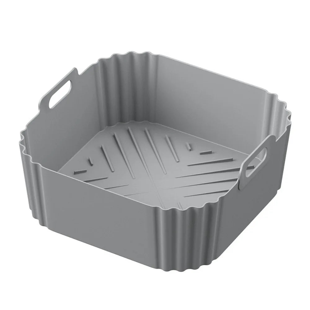 This Silicone Air Fryer Basket offers an eco-friendly, reusable solution for healthier cooking. Made from durable silicone, it ensures non-stick, oil-free food preparation while fitting universally in most air fryer models. Its flexible design makes it easy to use and store, enhancing convenience without compromising performance. Ideal for those seeking a sustainable and practical kitchen accessory.