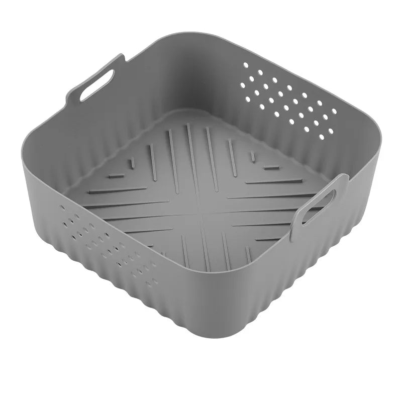 This Silicone Air Fryer Basket offers an eco-friendly, reusable solution for healthier cooking. Made from durable silicone, it ensures non-stick, oil-free food preparation while fitting universally in most air fryer models. Its flexible design makes it easy to use and store, enhancing convenience without compromising performance. Ideal for those seeking a sustainable and practical kitchen accessory.