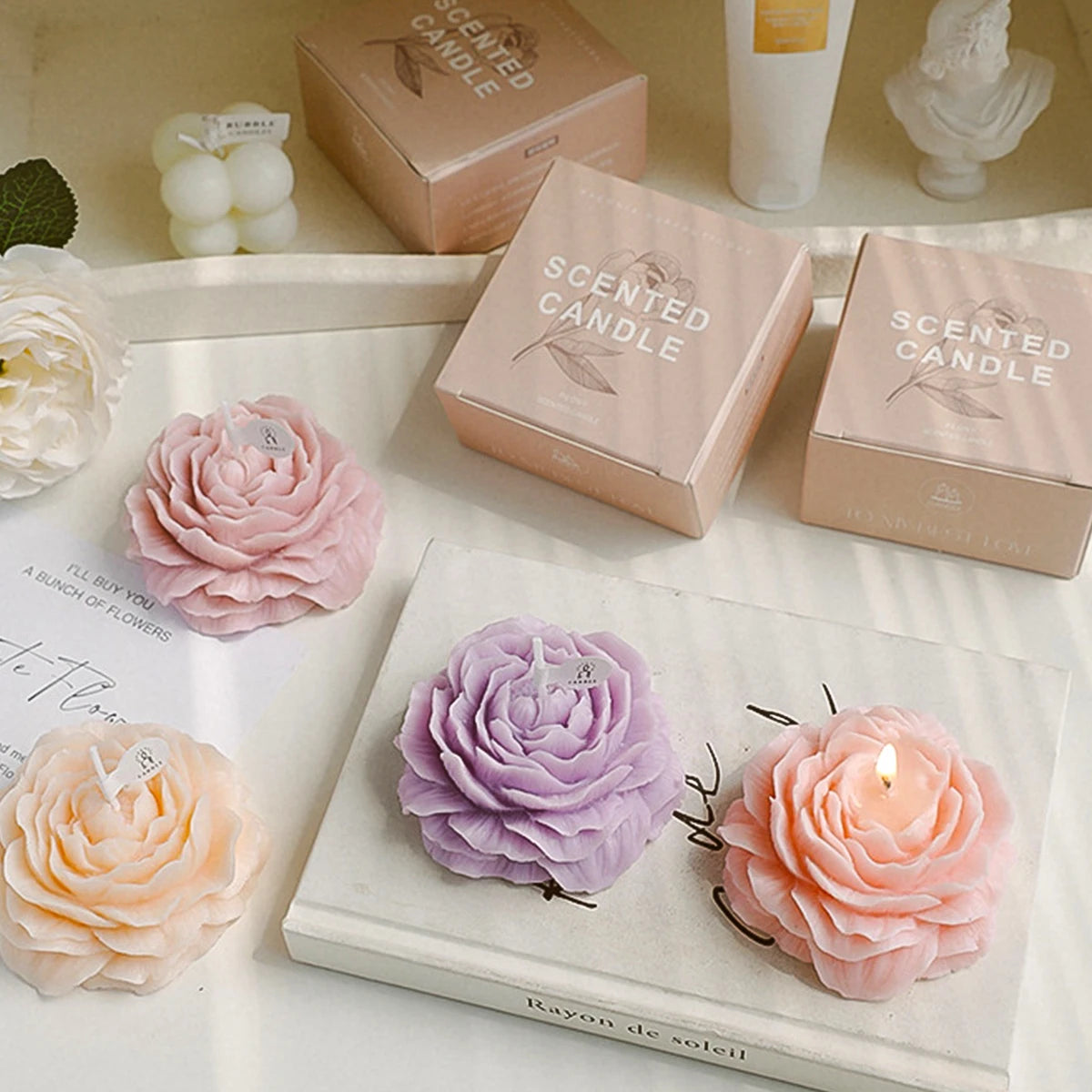 Experience refined relaxation with our Flower Shape Aromatherapy Candle, crafted from organic soy wax for a clean, eco-friendly burn. Each candle is delicately molded into a floral design and infused with expertly blended scents including White Peach, French Lavender, Maid Of Berlin, and Reverse Paris. This carefully curated combination promotes calmness and enhances your environment with subtle, sophisticated fragrance notes. Ideal for creating a tranquil atmosphere while supporting sustainable living.