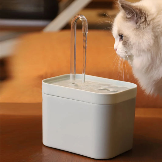 A modern water fountain with a sleek square design, dimensions labelled, showcasing a clear water stream and minimalistic style.