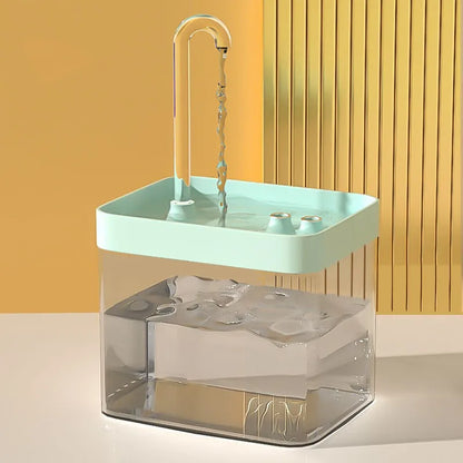 A modern water fountain with a sleek square design, dimensions labelled, showcasing a clear water stream and minimalistic style.