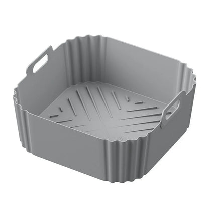 This Silicone Air Fryer Basket offers an eco-friendly, reusable solution for healthier cooking. Made from durable silicone, it ensures non-stick, oil-free food preparation while fitting universally in most air fryer models. Its flexible design makes it easy to use and store, enhancing convenience without compromising performance. Ideal for those seeking a sustainable and practical kitchen accessory.