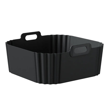 This Silicone Air Fryer Basket offers an eco-friendly, reusable solution for healthier cooking. Made from durable silicone, it ensures non-stick, oil-free food preparation while fitting universally in most air fryer models. Its flexible design makes it easy to use and store, enhancing convenience without compromising performance. Ideal for those seeking a sustainable and practical kitchen accessory.