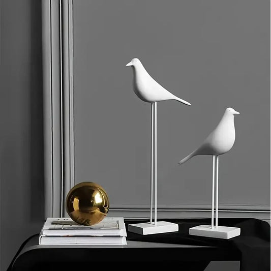 Crafted from durable resin, this handicrafts bird statue embodies a modern Nordic design, combining simplicity with elegant form. Its refined silhouette brings a touch of contemporary artistry to any setting, making it a perfect decorative piece for homes or offices seeking subtle sophistication and timeless style.
